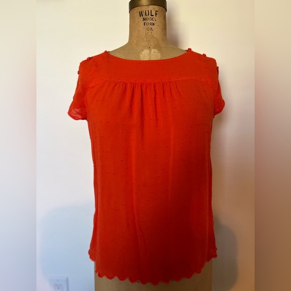 Anthropologie Tops - Anthropologie Maeve orange blouse with button sleeves and little dot design
